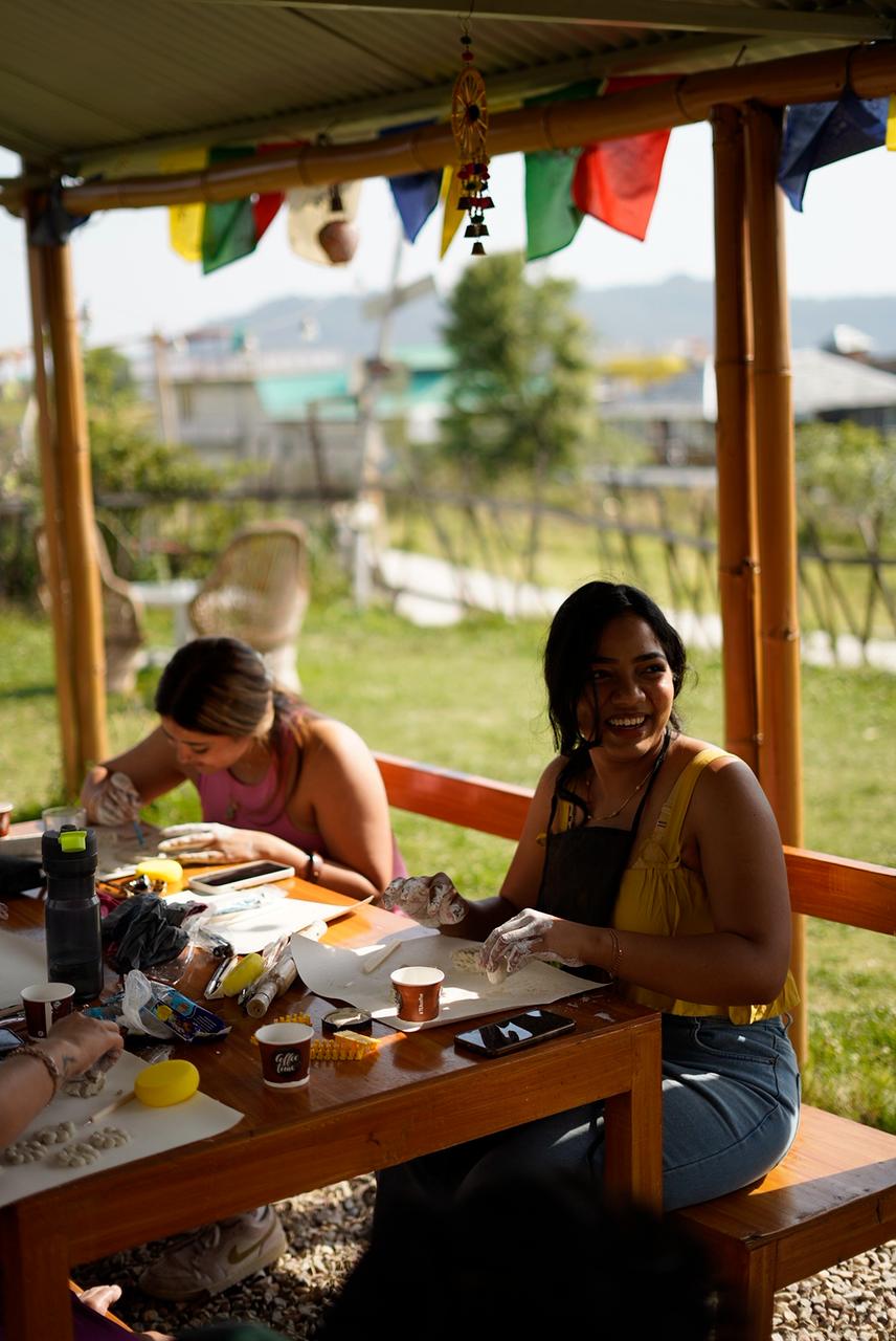 Retreat participants gathered around a table for a workshop